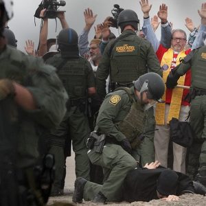 Dozens of faith leaders arrested at San Diego 'Love Knows No Borders' protest
