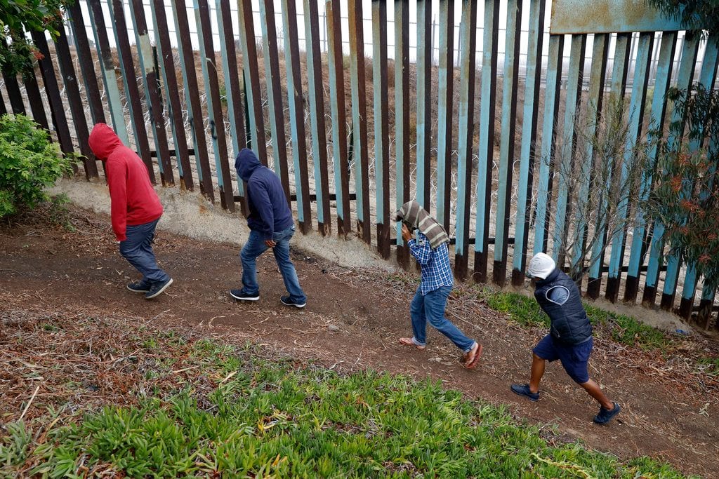 Honduran, woman, 19, scales border wall to give birth in US