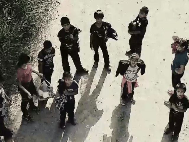 Migrant Families Cross Texas Border Seeking Asylum