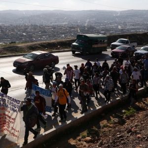 Migrants demand Trump let them in or pay them each $50G