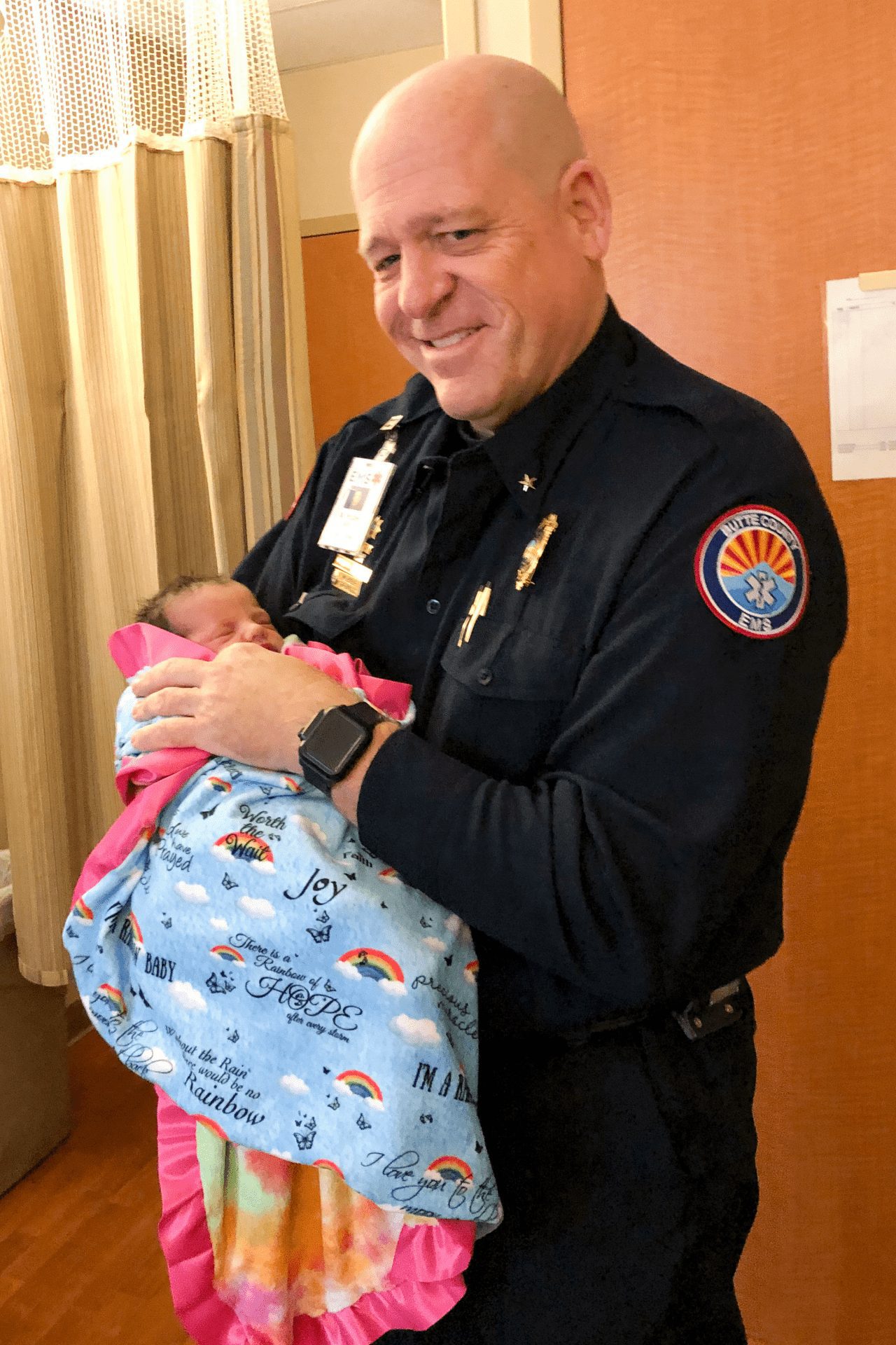 Woman names baby after medic who saved her during wildfire
