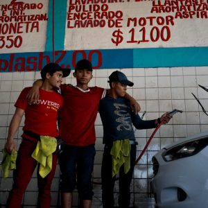 Working while they wait, migrants seek jobs at US border