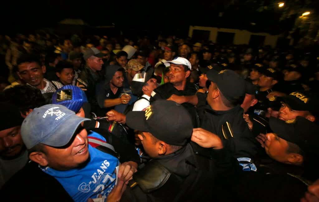 Nearly 1,000 caravan migrants start process of entering Mexico from Guatemala